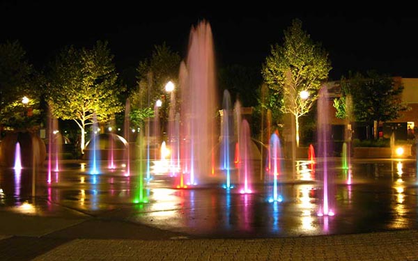 Lights illuminate the splash pad at Festival Park in Elgin, IL