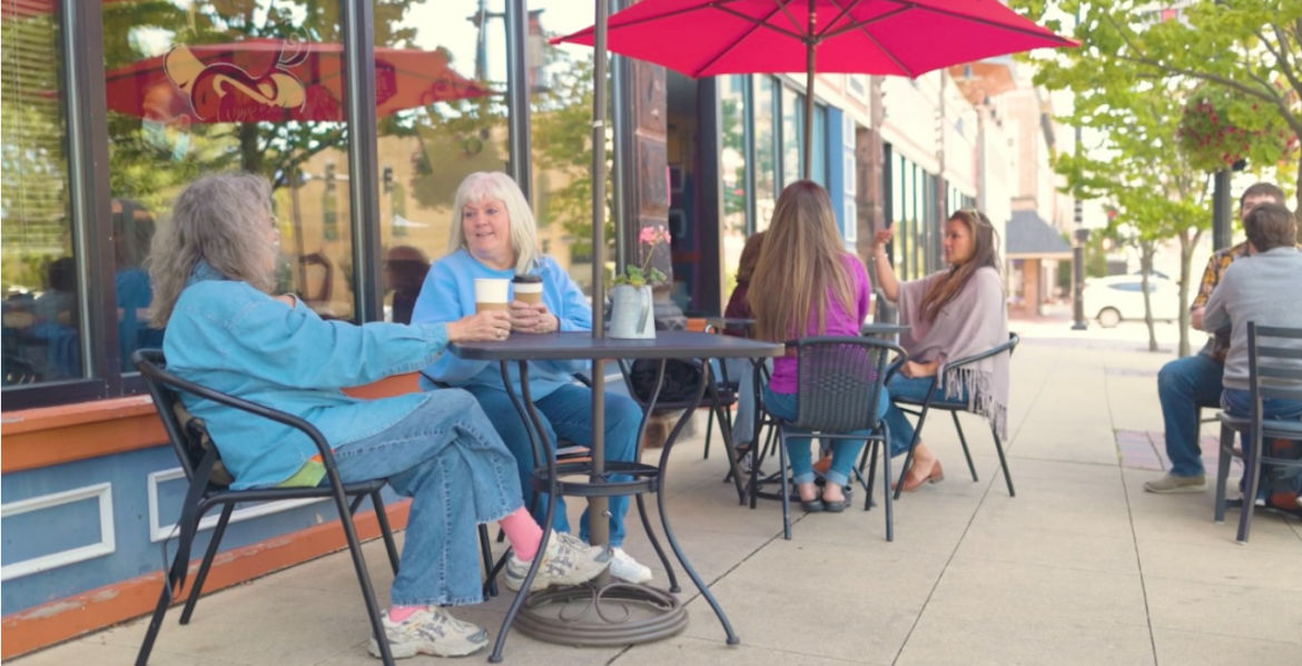 two women enjoying the outdoor dining scene in the Elgin Area at a local cafe